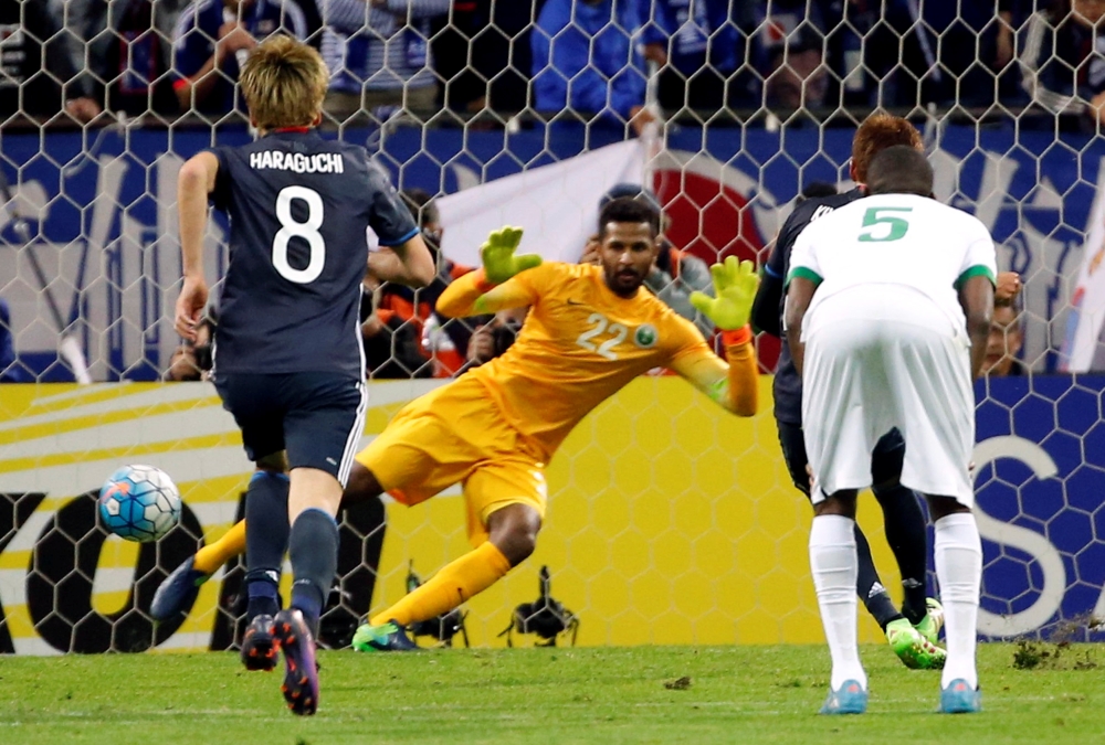 Football Soccer - Japan v Saudi Arabia - World Cup 2018 Qualifier - Saitama Stadium 2002, Saitama, Japan - 15/11/16. Japan's Hiroshi Kiyotake scores their first goal from the penalty spot. REUTERS/Toru Hanai