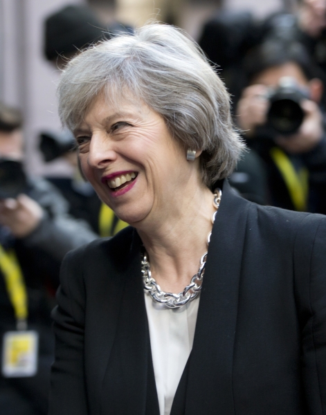 British Prime Minister Theresa May arrives for an EU Summit in Brussels on Thursday, Dec. 15, 2016. European Union leaders meet Thursday in Brussels to discuss defense, migration, the conflict in Syria and Britain's plans to leave the bloc. (AP Photo/Virginia Mayo)