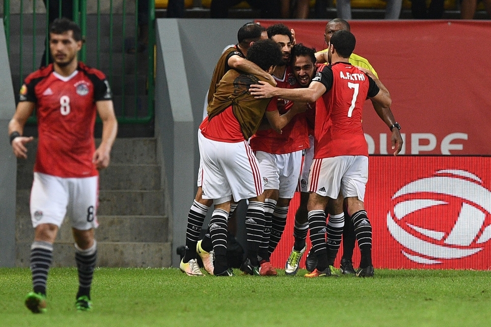 



لاعبو مصر يحتفلون بالتأهل (أ ف ب)
