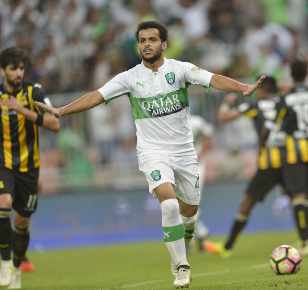 عبدالفتاح عسيري محتفلا بالهدف الثالث الذي سجله في الاتحاد. (تصوير:ناصر محسن )