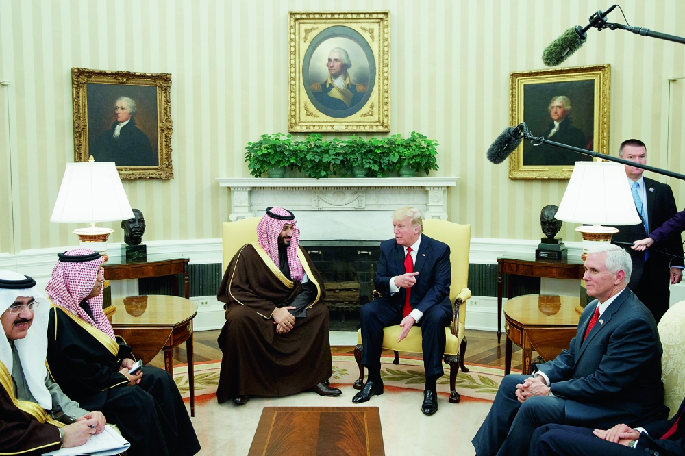 President Donald Trump meets with Saudi Defense Minister and Deputy Crown Prince Mohammed bin Salman bin Abdulaziz Al Saud in the Oval Office of the White House in Washington, Tuesday, March 14, 2017. (AP Photo/Evan Vucci)