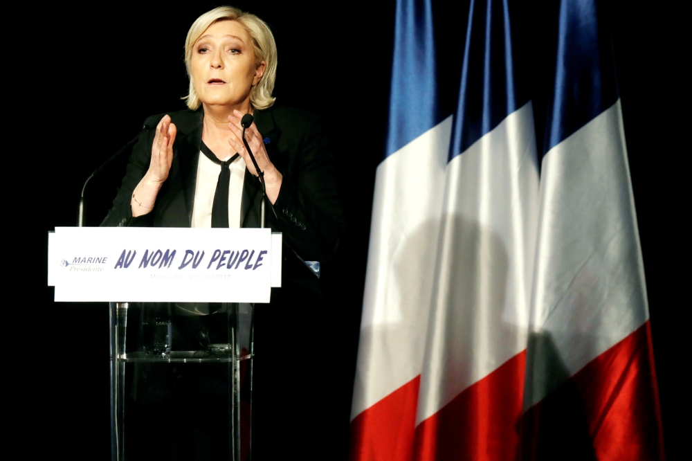 Marine Le Pen, French National Front (FN) political party leader and candidate for French 2017 presidential election, attends a political rally in Monswiller, near Strasbourg, France April 5, 2017. REUTERS/Christian Hartmann