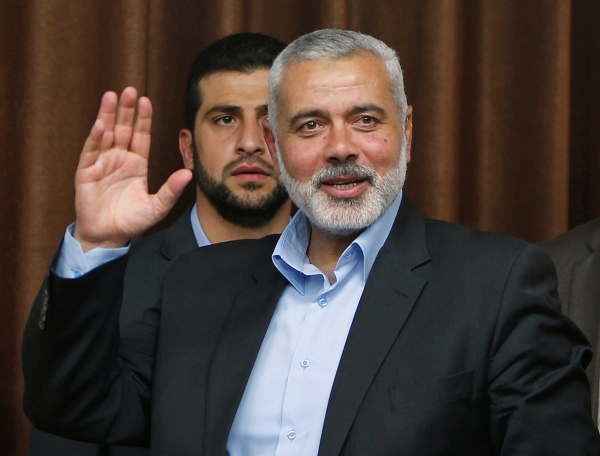 FILE PHOTO: Senior Hamas leader Ismail Haniyeh waves as he arrives to deliver a farewell speech for his former position as a Hamas government Prime Minister, in Gaza City June 2, 2014. REUTERS/Suhaib Salem/File Photo