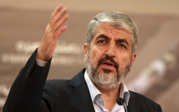 FILE - In this Aug. 28, 2014, file photo, Khaled Mashaal former leader of the Palestinian Islamic militant movement Hamas, that has governed Gaza since a 2007 takeover, speaks during a speech held in Katara in Doha, Qatar. Hamas confirms Ismail Haniyeh, a former Gaza prime minister, has been elected as the Islamic militant group's new top leader. (AP Photo/Osama Faisal, File)