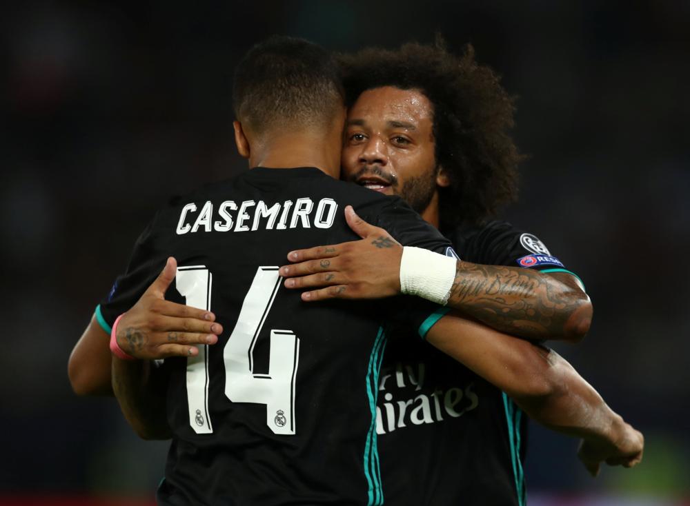 Soccer Football - Real Madrid v Manchester United - Super Cup Final - Skopje, Macedonia - August 8, 2017   Real Madrid’s Casemiro celebrates scoring their first goal with Marcelo   REUTERS/Eddie Keogh