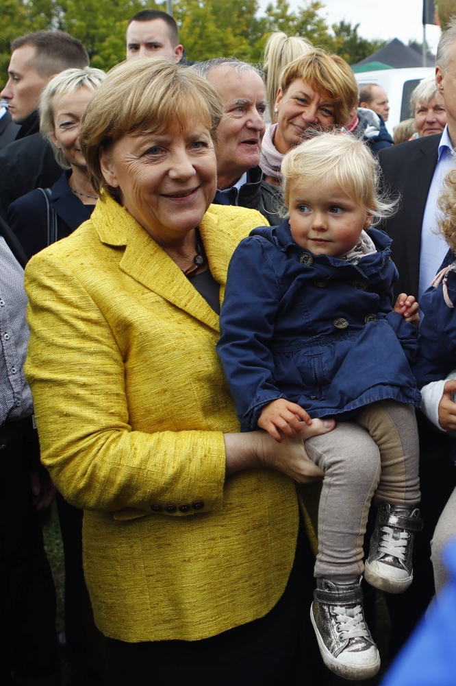 German Chancellor Angela Merkel visits harvest festival in Lauterbach, Germany, September 23, 2017. REUTERS/Axel Schmidt