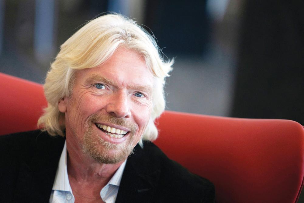 Richard Branson, founder and chairman of Virgin Group Ltd., sits for a photo at the new Terminal 2 at San Francisco International Airport in San Francisco, California, U.S., on Wednesday, April 6, 2011. Branson said he intends to remain a 