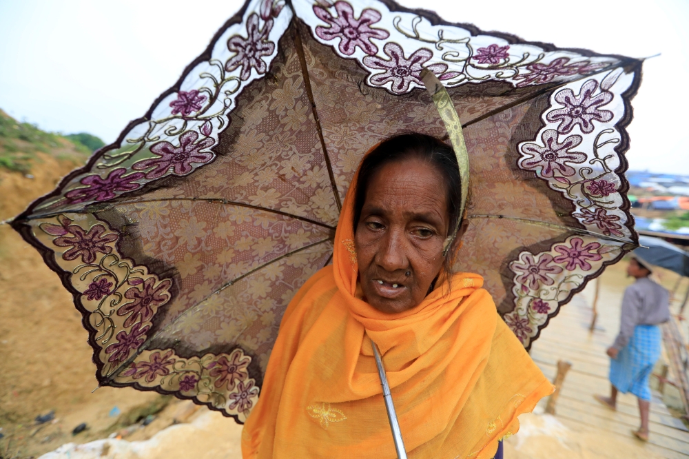 A Rohingya refugee woman walks in Kutupalong refugees camp in Cox's Bazar, Bangladesh, October 20, 2017. REUTERS/ Zohra Bensemra