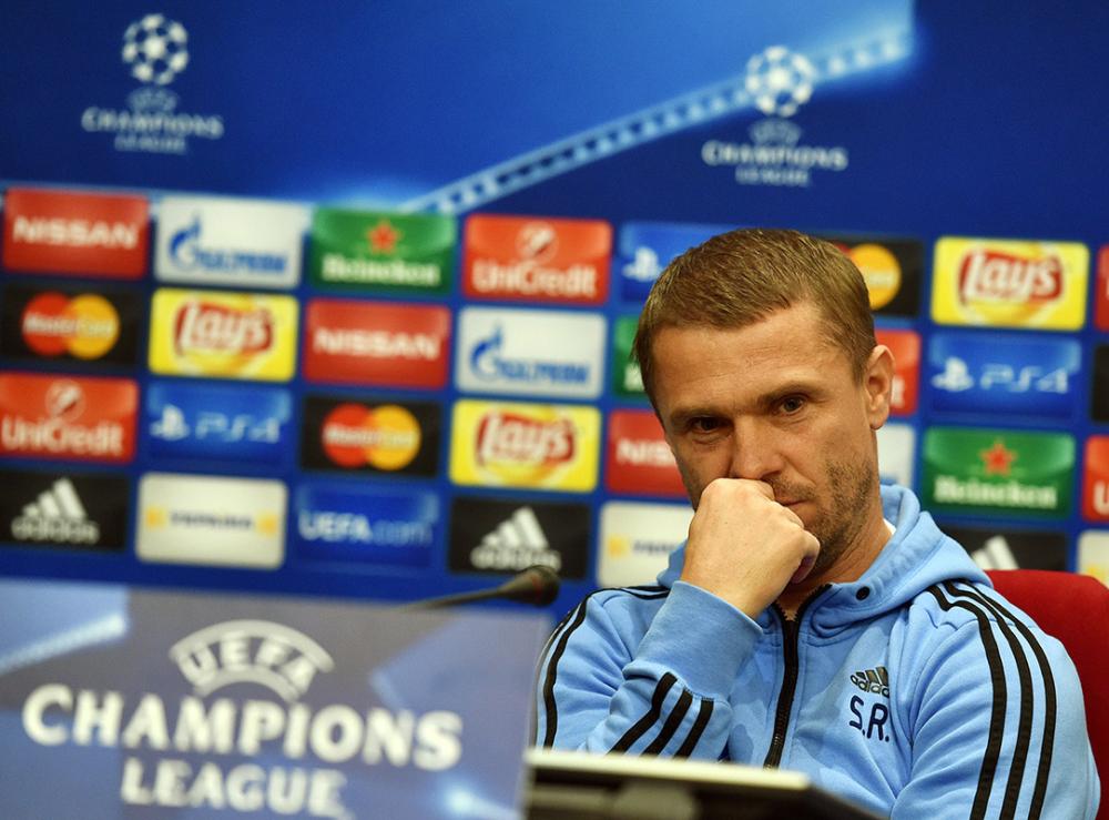 FC Dynamo Kiev's coach Serhiy Rebrov gestures during a press conference at the training base near Kiev on October 19, 2015, a day before Champion's League Group G football match between FC Dynamo and Chelsea FC. AFP PHOTO / GENYA SAVILOV (Photo credit should read GENYA SAVILOV/AFP/Getty Images)