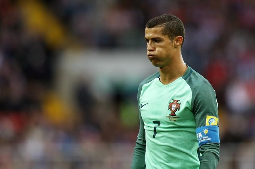 MOSCOW, RUSSIA - JUNE 21: Cristiano Ronaldo of Portugal reacts during the FIFA Confederations Cup Russia 2017 Group A match between Russia and Portugal at Spartak Stadium on June 21, 2017 in Moscow, Russia.  (Photo by Francois Nel/Getty Images)