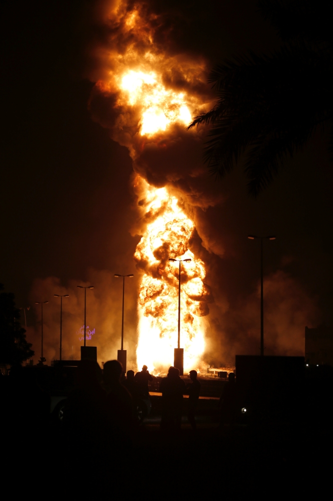 A fire is seen from an oil pipeline in Buri village south of Manama, Bahrain, November 10, 2017. Picture taken November 10, 2017. REUTERS/Hamad I Mohammed