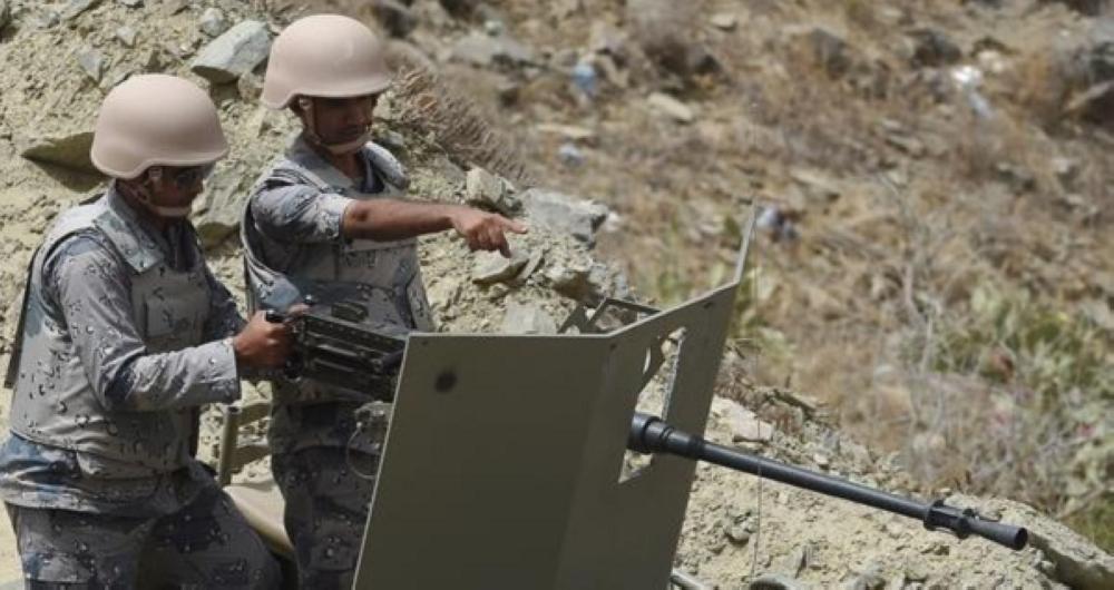 Saudi border guards stand on an armed military vehicle to patrol the Saudi-Yemeni border, in southwestern Saudi Arabia, on April 9, 2015. The Saudi-led coalition launched its air war on March 26, 2015, as the rebels closed on Yemeni President Abedrabbo Mansour Hadi's last refuge in Aden, prompting him to flee to neighbouring Saudi Arabia. AFP PHOTO / FAYEZ NURELDINE

        (Photo credit should read FAYEZ NURELDINE/AFP/Getty Images)