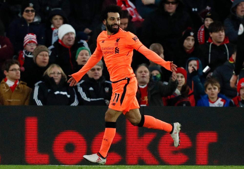 محمد صلاح محتفلا بأحد أهدافه