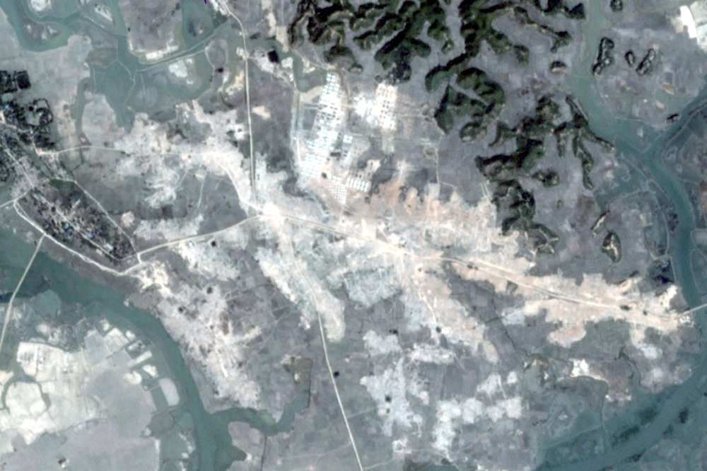 This handout satellite image taken by DigitalGlobe on February 19, 2018 and released by Human Rights Watch on February 23, 2018 allegedly shows ongoing demolition of Rohingya villages in Myanmar's northern Rakhine State. Satellite imagery shows Myanmar authorities have bulldozed at least 55 Rohingya villages in northern Rakhine in recent months, Human Rights Watch said on February 23, 2018, condemning the government for erasing evidence at sites where troops are accused of atrocities. - -----EDITORS NOTE --- RESTRICTED TO EDITORIAL USE - MANDATORY CREDIT «AFP PHOTO / DIGITALGLOBE via Human Rights Watch» - NO MARKETING - NO ADVERTISING CAMPAIGNS - DISTRIBUTED AS A SERVICE TO CLIENTS - NO ARCHIVES
 / AFP / DIGITALGLOBE / HUMAN RIGHTS WATCH / Handout / -----EDITORS NOTE --- RESTRICTED TO EDITORIAL USE - MANDATORY CREDIT «AFP PHOTO / DIGITALGLOBE via Human Rights Watch» - NO MARKETING - NO ADVERTISING CAMPAIGNS - DISTRIBUTED AS A SERVICE TO CLIENTS - NO ARCHIVES
