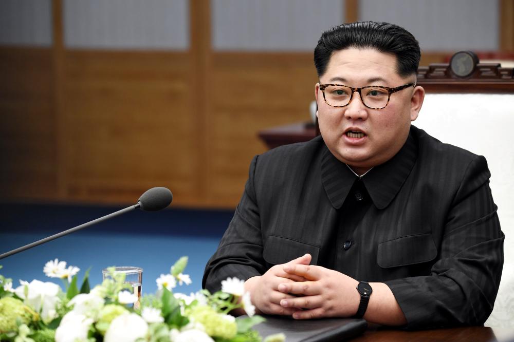 North Korean leader Kim Jong Un speaks during a meeting with South Korean President Moon Jae-in at the Peace House at the truce village of Panmunjom inside the demilitarized zone separating the two Koreas, South Korea, April 27, 2018.   Korea Summit Press Pool/Pool via Reuters