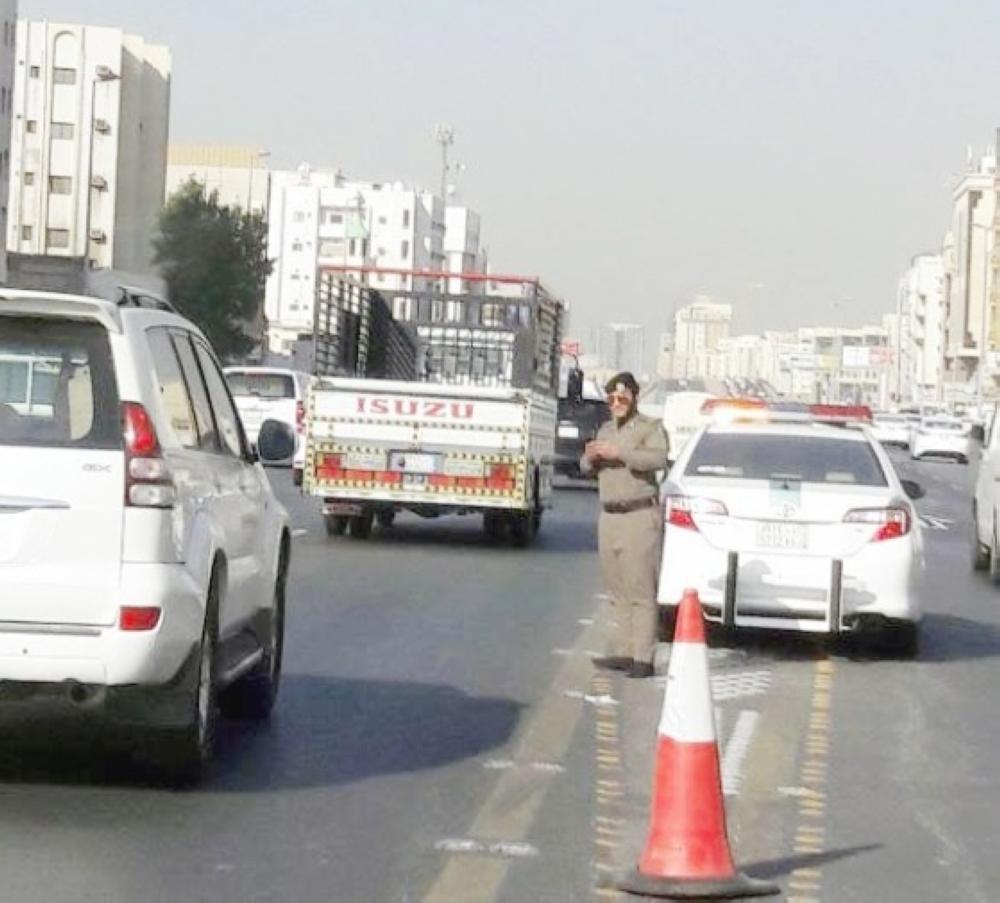 رجل المرور في طرقات جدة.