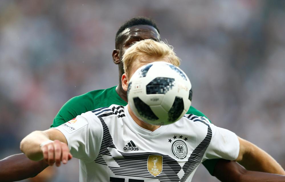 Soccer Football - International Friendly - Germany vs Saudi Arabia - BayArena, Leverkusen, Germany - June 8, 2018   Saudi Arabia's Omar Hawsawi and Germany's Julian Brandt in action during the match   REUTERS/Thilo Schmuelgen