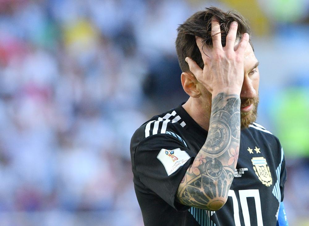 Argentina's forward Lionel Messi reacts at the end of the Russia 2018 World Cup Group D football match between Argentina and Iceland at the Spartak Stadium in Moscow on June 16, 2018. RESTRICTED TO EDITORIAL USE - NO MOBILE PUSH ALERTS/DOWNLOADS
 / AFP / Mladen ANTONOV / RESTRICTED TO EDITORIAL USE - NO MOBILE PUSH ALERTS/DOWNLOADS
