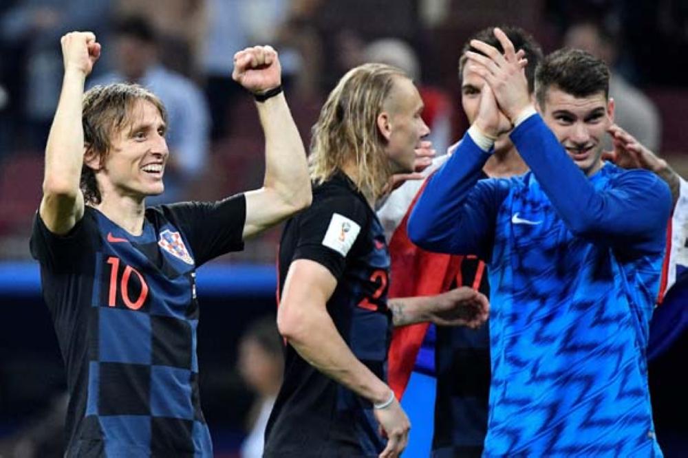 Croatia's midfielder Luka Modric celebrates his team's victory at the end of the Russia 2018 World Cup semi-final football match between Croatia and England at the Luzhniki Stadium in Moscow on July 11, 2018. RESTRICTED TO EDITORIAL USE - NO MOBILE PUSH ALERTS/DOWNLOADS

 / AFP / Alexander NEMENOV / RESTRICTED TO EDITORIAL USE - NO MOBILE PUSH ALERTS/DOWNLOADS

