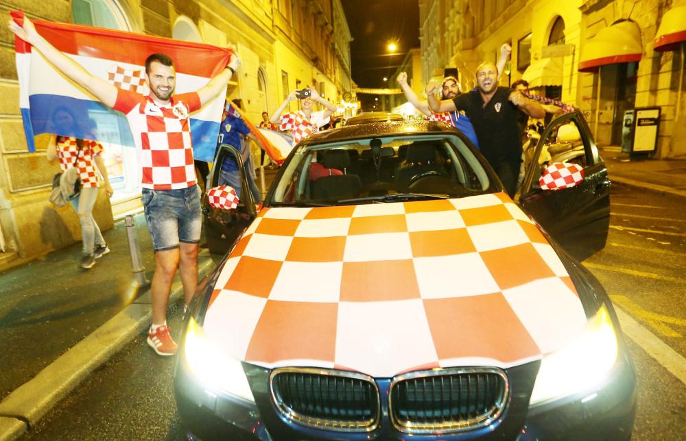 Soccer Football - World Cup - Semi-Final - Croatia v England - Zagreb, Croatia - July 11, 2018. Croatia's fans celebrate after Croatia beat England in semi-final. REUTERS/Antonio Bronic