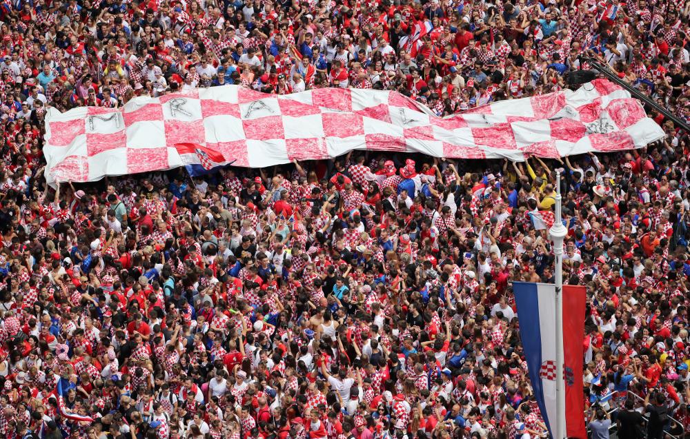 Soccer Football - World Cup - The Croatia team return from the World Cup in Russia - Zagreb, Croatia - July 16, 2018 Croatia fans await the arrival of the team at the main square in Zagreb REUTERS/Marko Djurica