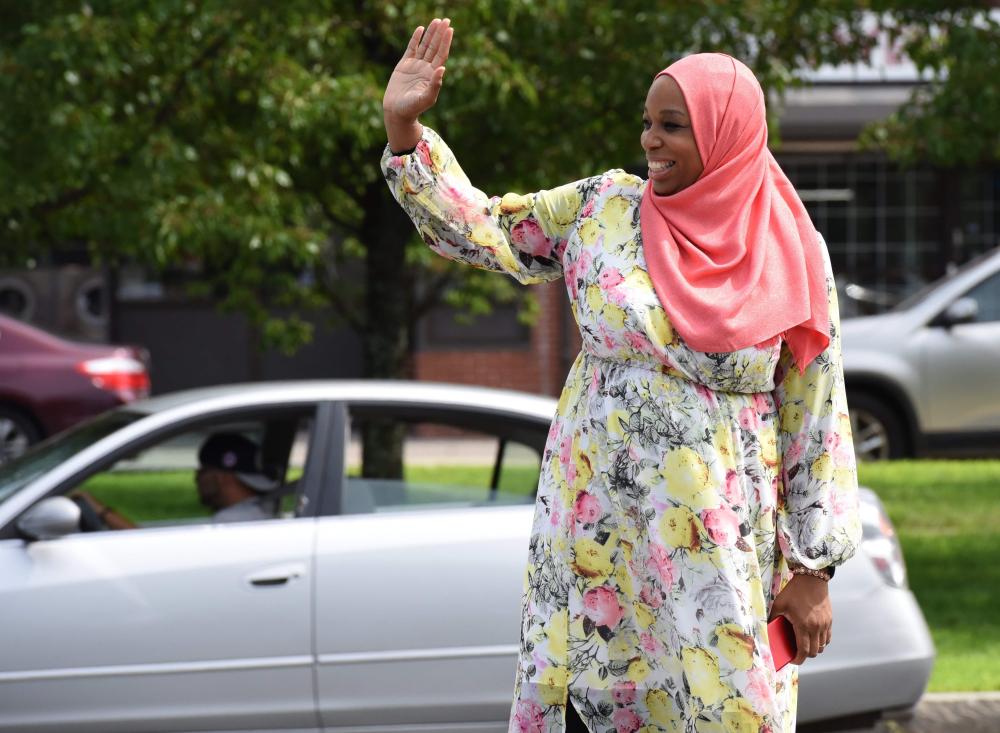 Tahirah Amatul-Wadud, who is running in the Democratic primary for US Congress in Massachusetts’ First District, goes on a door-knocking and voter registration drive in Chicopee, Massachusetts, July 21, 2018.  Amatul-Wadud is a mother of seven, a lawyer, a community activist and a Muslim, who rises before dawn, prays five times a day and fasts during Ramadan. Now aged 44, she faces the biggest hurdle of her life: asking a majority white constituency, where Catholics are the biggest religious group, to make her the first Muslim woman elected into Congress.
 - With AFP Story by Jennie MATTHEW:  The race for first Muslim woman in US Congress
 / AFP / TIMOTHY A. CLARY / With AFP Story by Jennie MATTHEW:  The race for first Muslim woman in US Congress
