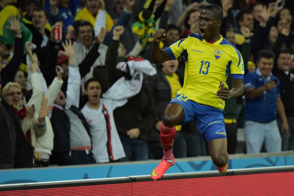 Ecuador's forward Enner Valencia celebrates after scoring during a Group E football match between Honduras and Ecuador at the Baixada Arena in Curitiba during the 2014 FIFA World Cup on June 20, 2014.              AFP PHOTO / GABRIEL BOUYS
