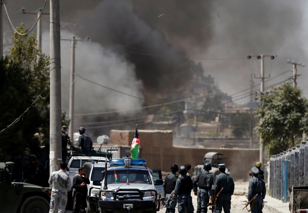 Smoke rises from the site of an attack in Kabul, Afghanistan August 21, 2018.REUTERS/Mohammad Ismail