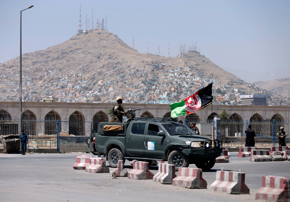 Afghan security forces keep watch at the site of an attack in Kabul, Afghanistan August 21, 2018.REUTERS/Mohammad Ismail