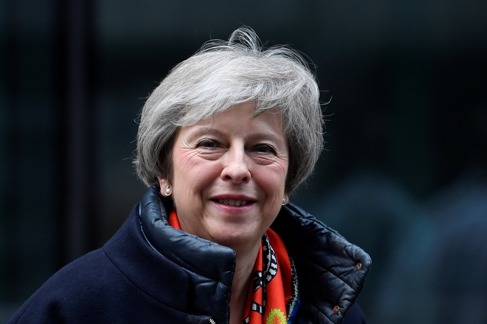 Britain's Prime Minister Theresa May leaves the BBC, after taking part in a live radio phone-in, in central London, Britain, November 23, 2018. REUTERS/Toby Melville