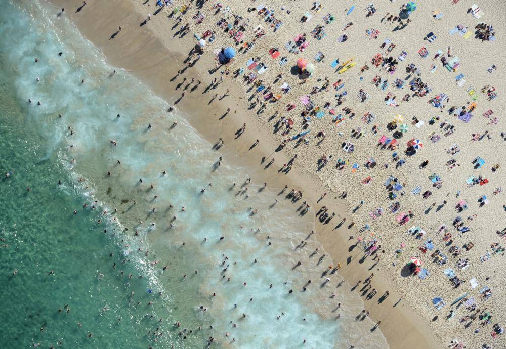 

Scenes from 500 feet above Coogee and Bondi beaches where temps headed into the mid-thirty degree celcius on Saturday afternoon as thousands headed to Sydney's beaches.