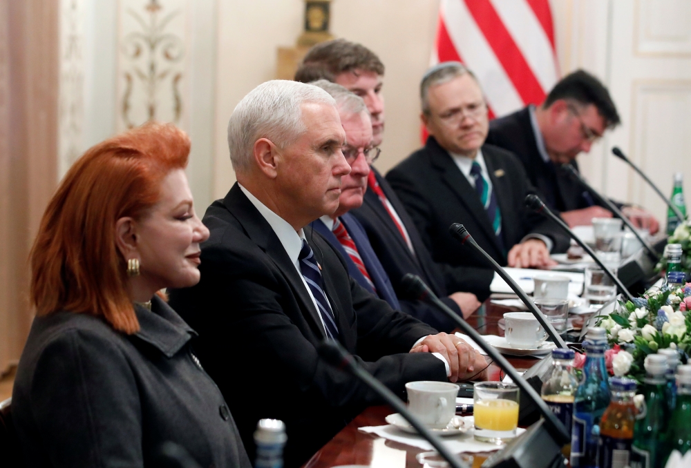 U.S. Vice President Mike Pence, next to U.S. Ambassador to Poland Georgette Mosbacher, attends a meeting with Polish President Andrzej Duda at Belvedere Palace in Warsaw, Poland, February 13, 2019. REUTERS/Kacper Pempel