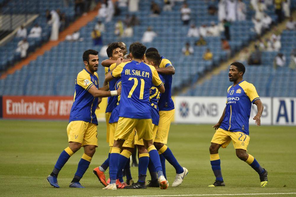 Nassr's players celebrate their goal during the AFC Champions League group A football match between Saudi's Al Nassr and Iraq's Al Zawraa at the King Fahd International Stadium in the Saudi capital Riyadh on April 8, 2019.
 / AFP
