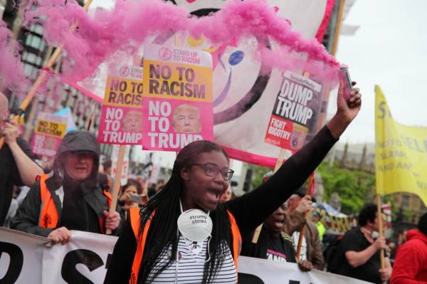 Demonstrators take part in a protest against U.S. President Donald Trump, in London, Britain, June 4, 2019. REUTERS/Alkis Konstantinidis