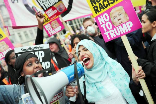 Demonstrators take part in a protest against U.S. President Donald Trump, in London, Britain, June 4, 2019. REUTERS/Alkis Konstantinidis