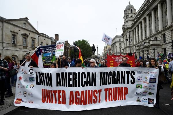 Demonstrators take part in a protest against U.S. President Donald Trump, in London, Britain, June 4, 2019. REUTERS/Clodagh Kilcoyne