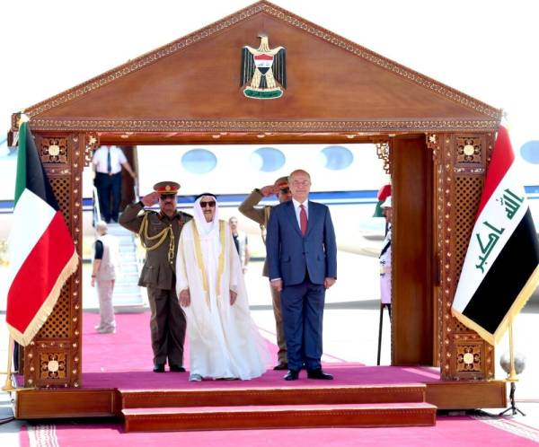 Iraq's President Barham Salih stands with Kuwait's ruling emir Sheikh Sabah al-Ahmad al-Sabah during a welcoming ceremony in Baghdad, Iraq, June 19, 2019. The Presidency of the Republic of Iraq Office/Handout via REUTERS ATTENTION EDITORS - THIS IMAGE WAS PROVIDED BY A THIRD PARTY.