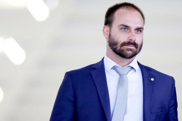 Brazilian Federal Deputy Eduardo Bolsonaro is seen after a meeting between Brazil's President Jair Bolsonaro and Paraguay's President Mario Abdo at the Itamaraty Palace in Brasilia, Brazil March 12, 2019. REUTERS/Ueslei Marcelino