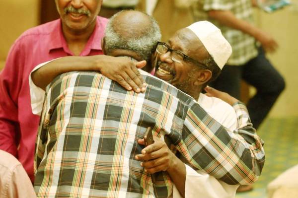 Protest leaders celebrate after the signing of the constitutional declaration with Sudan's army rulers, at a ceremony attended by African Union and Ethiopian mediators in the capital Khartoum on August 4, 2019. Sudan's army rulers and protest leaders today inked a hard-won constitutional declaration, paving the way for a promised transition to civilian rule. The agreement, signed during a ceremony witnessed by AFP, builds on a landmark power-sharing deal signed on July 17 and provides for a joint civilian-military ruling body to oversee the formation of a transitional civilian government and parliament to govern for a three-year transition period.
/ AFP / ASHRAF SHAZLY 