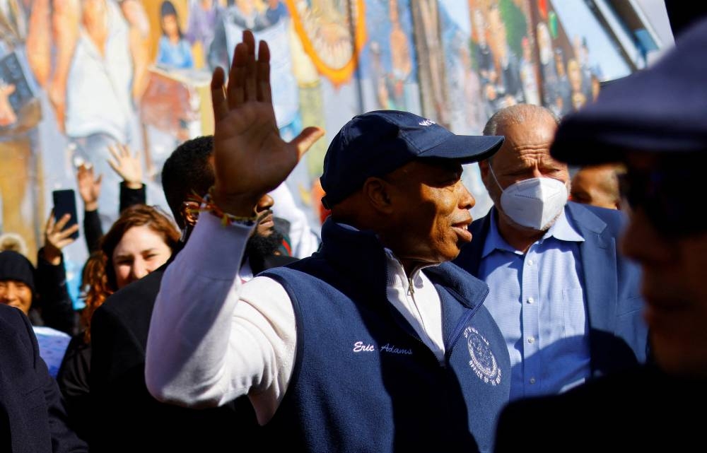 FILE PHOTO: New York City Mayor Eric Adams stands outside a shelter during his visit to discuss immigration with local authorities in El Paso, Texas, U.S., January 15, 2023. REUTERS/Jose Luis Gonzalez/File Photo