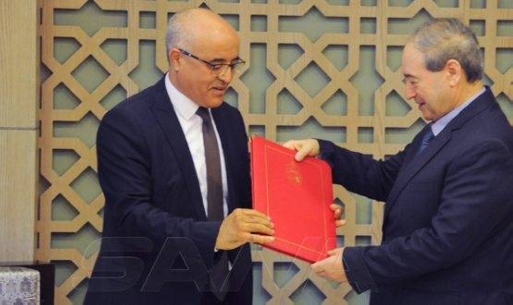 المقداد يتسلم أوراق اعتماد السفير التونسي.