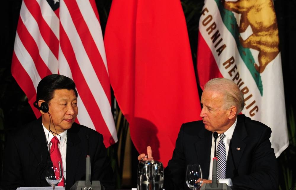 الرئيسان الصيني والأمريكي خلال لقاء سابق.