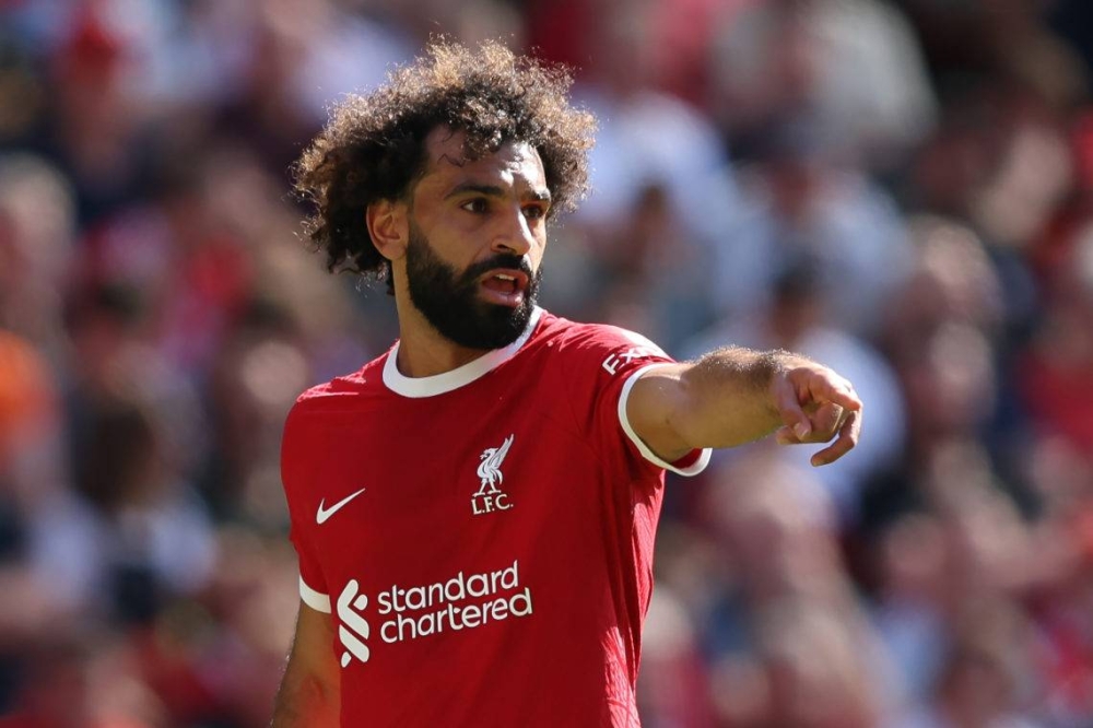 LIVERPOOL, ENGLAND - SEPTEMBER 03: Mohamed Salah of Liverpool points during the Premier League match between Liverpool FC and Aston Villa at Anfield on September 03, 2023 in Liverpool, England. (Photo by Matt McNulty/Getty Images)