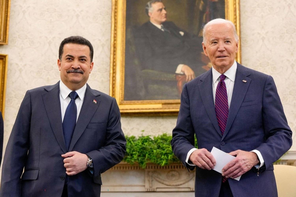 



الرئيس الأمريكي ورئيس الوزراء العراقي خلال لقائهما في واشنطن.