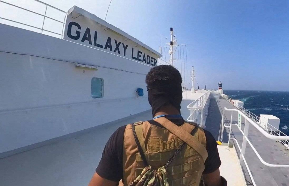 A Houthi fighter stands on the Galaxy Leader cargo ship in the Red Sea in this photo released November 20, 2023. Houthi Military Media/Handout via REUTERS    THIS IMAGE HAS BEEN SUPPLIED BY A THIRD PARTY